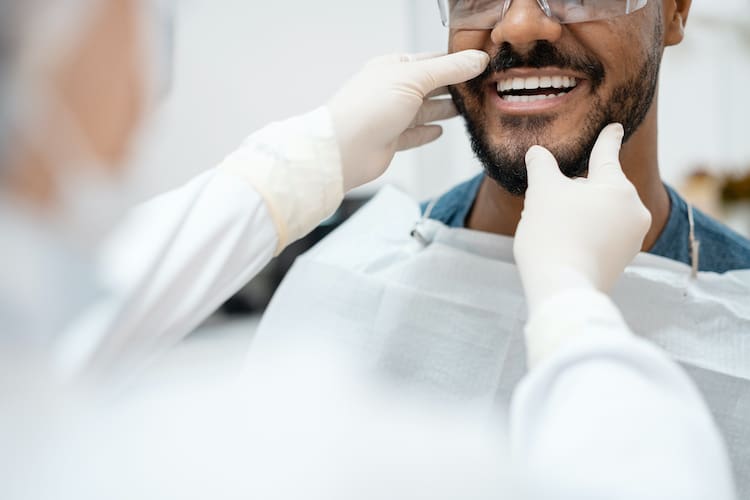 Several factors influence the longevity of a dental bridge, including oral hygiene practices and the bridge's location in the mouth.